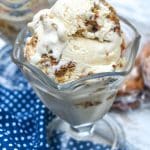 scoops of copycat little debbie oatmeal creme pie ice cream in a glass dish