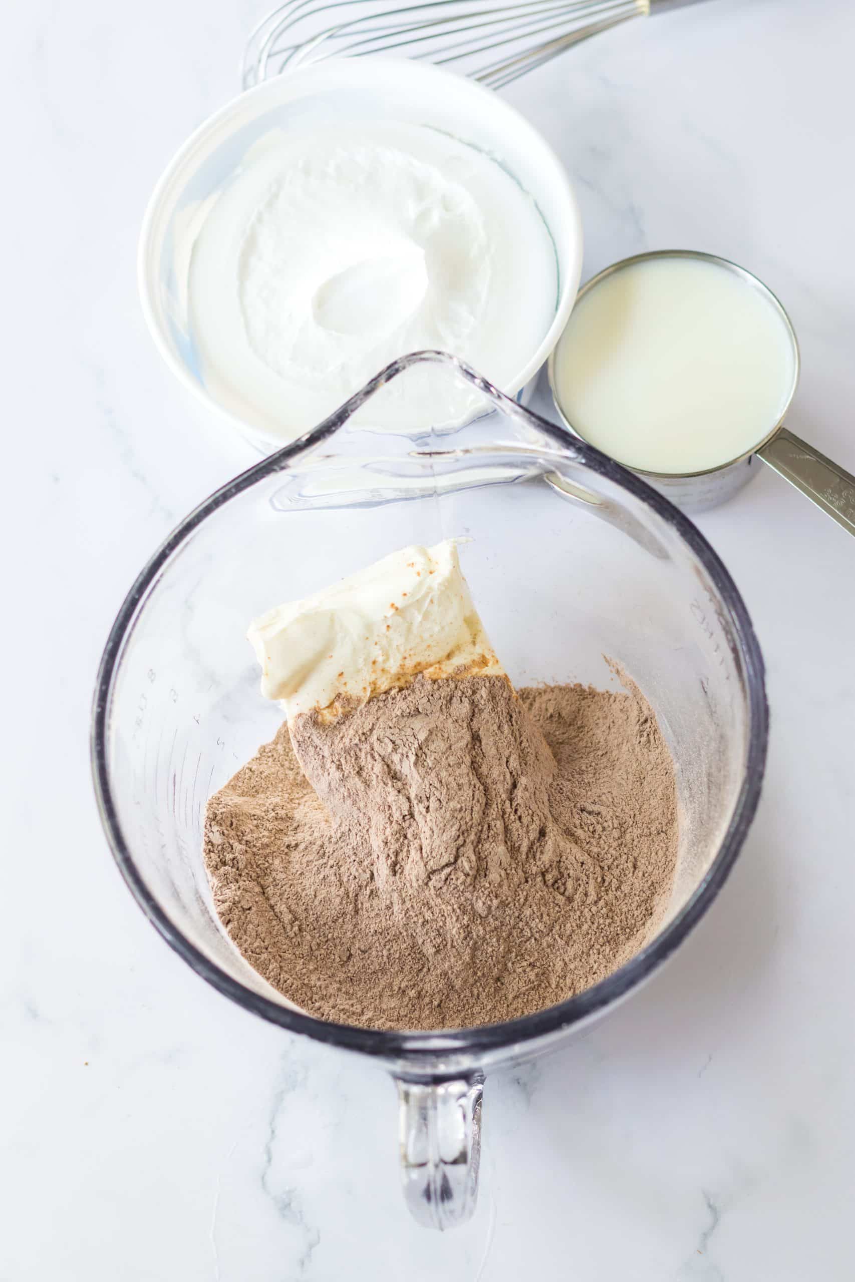chocolate pudding mix in a glass bowl