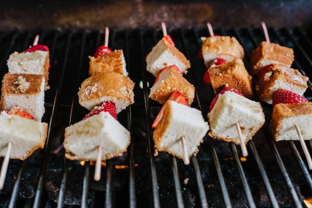 strawberry dessert kabobs on a grill