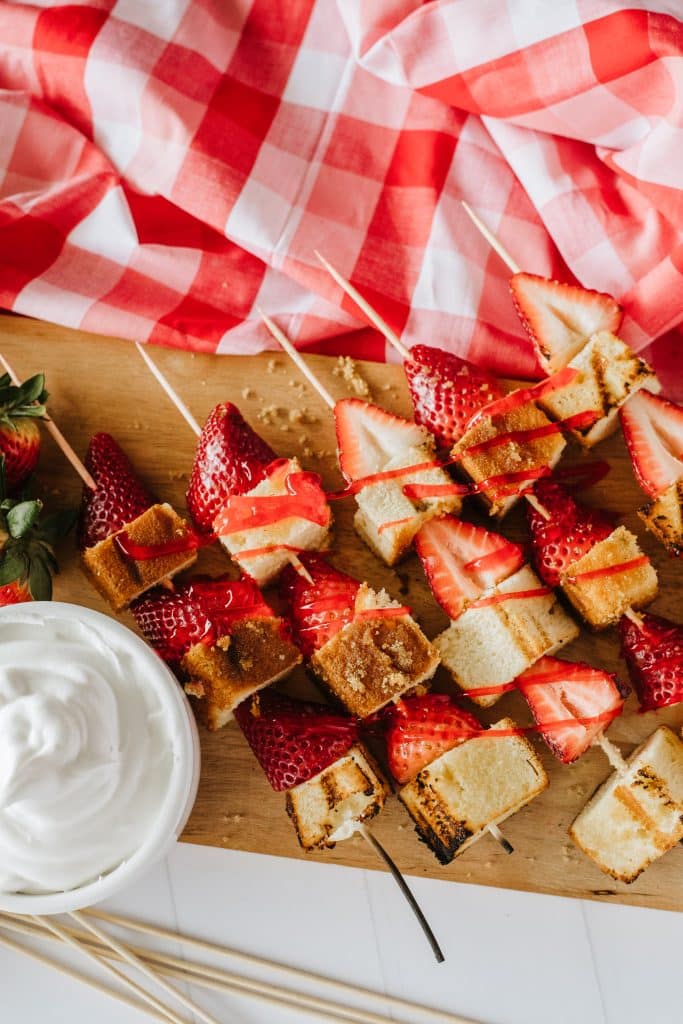 strawberry cake kabobs on a wooden skewer