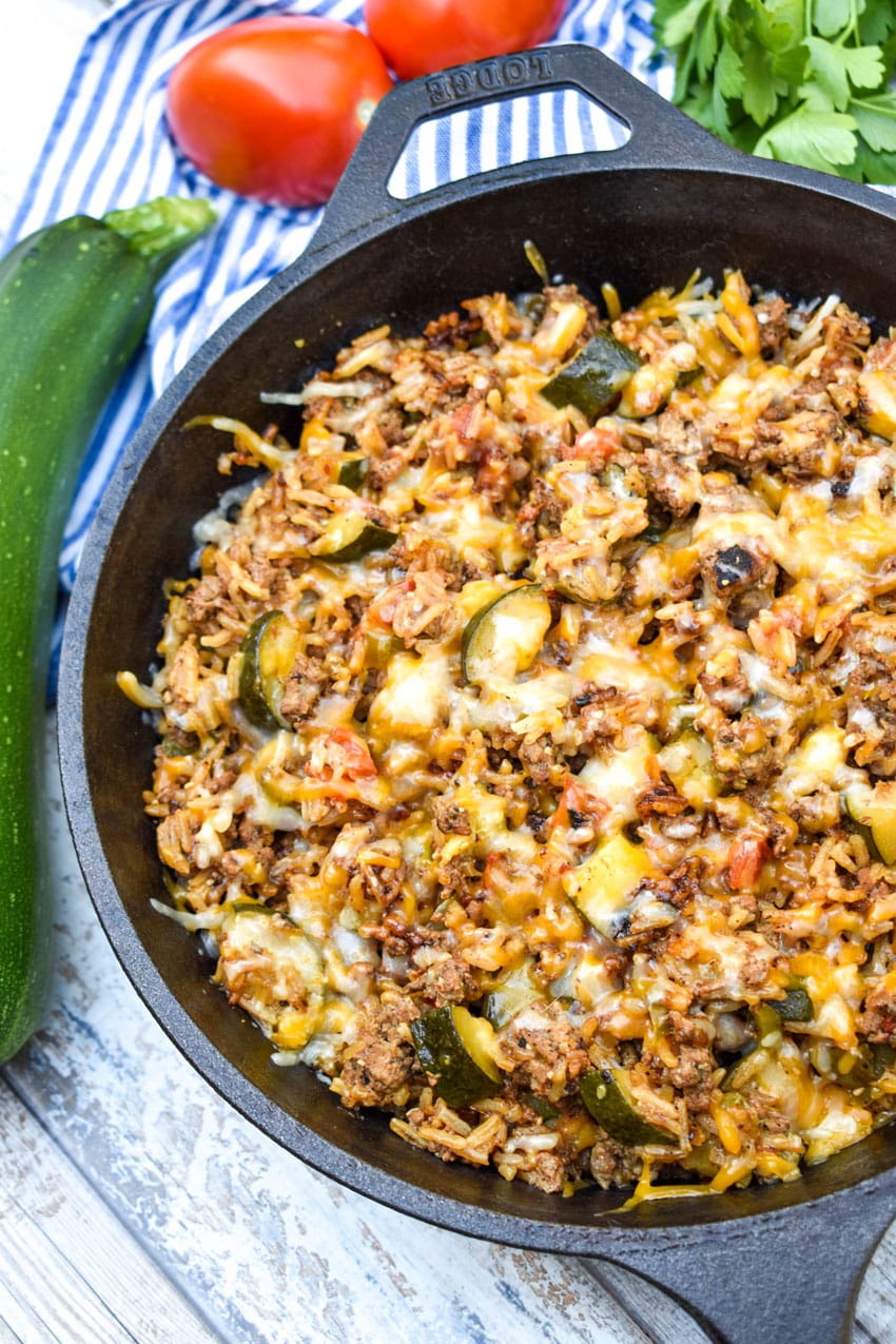 ground beef zucchini and rice skillet in a cast iron skillet
