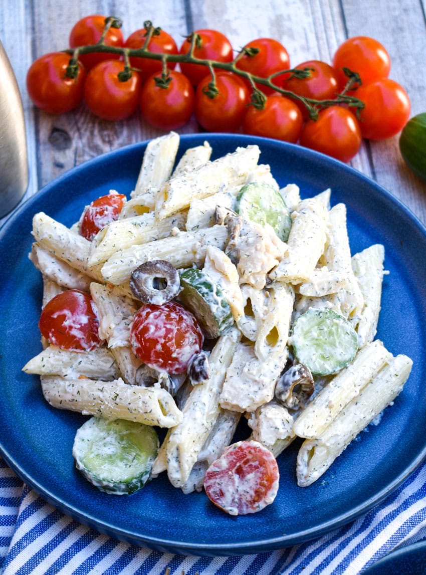 easy Greek pasta salad on a blue plate