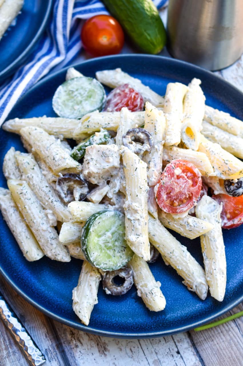 easy Greek pasta salad on a blue plate