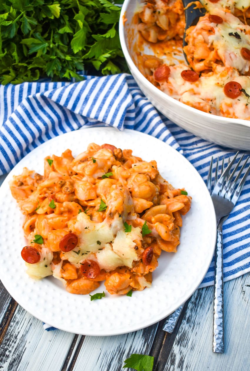 pizza mac and cheese (from a box) served on a white plate