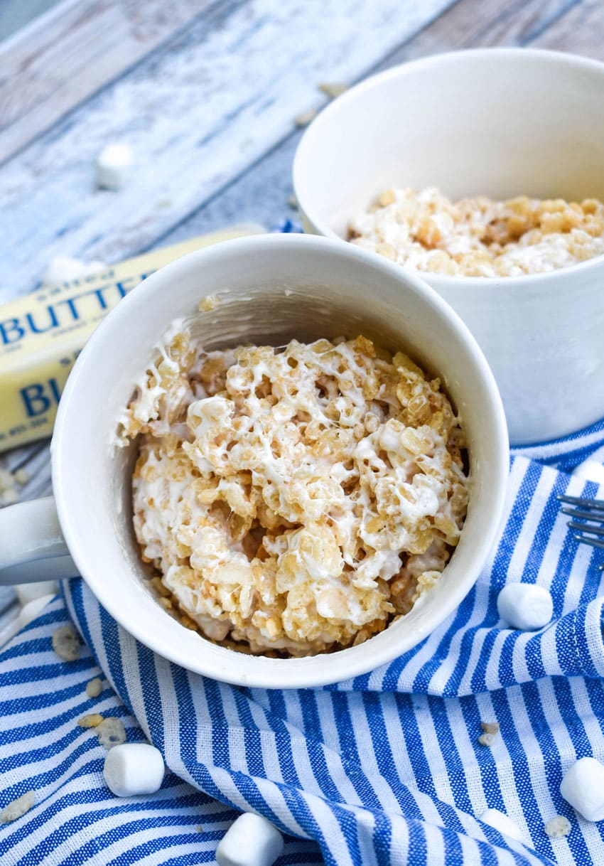 single serving rice krispie treats in two white mugs