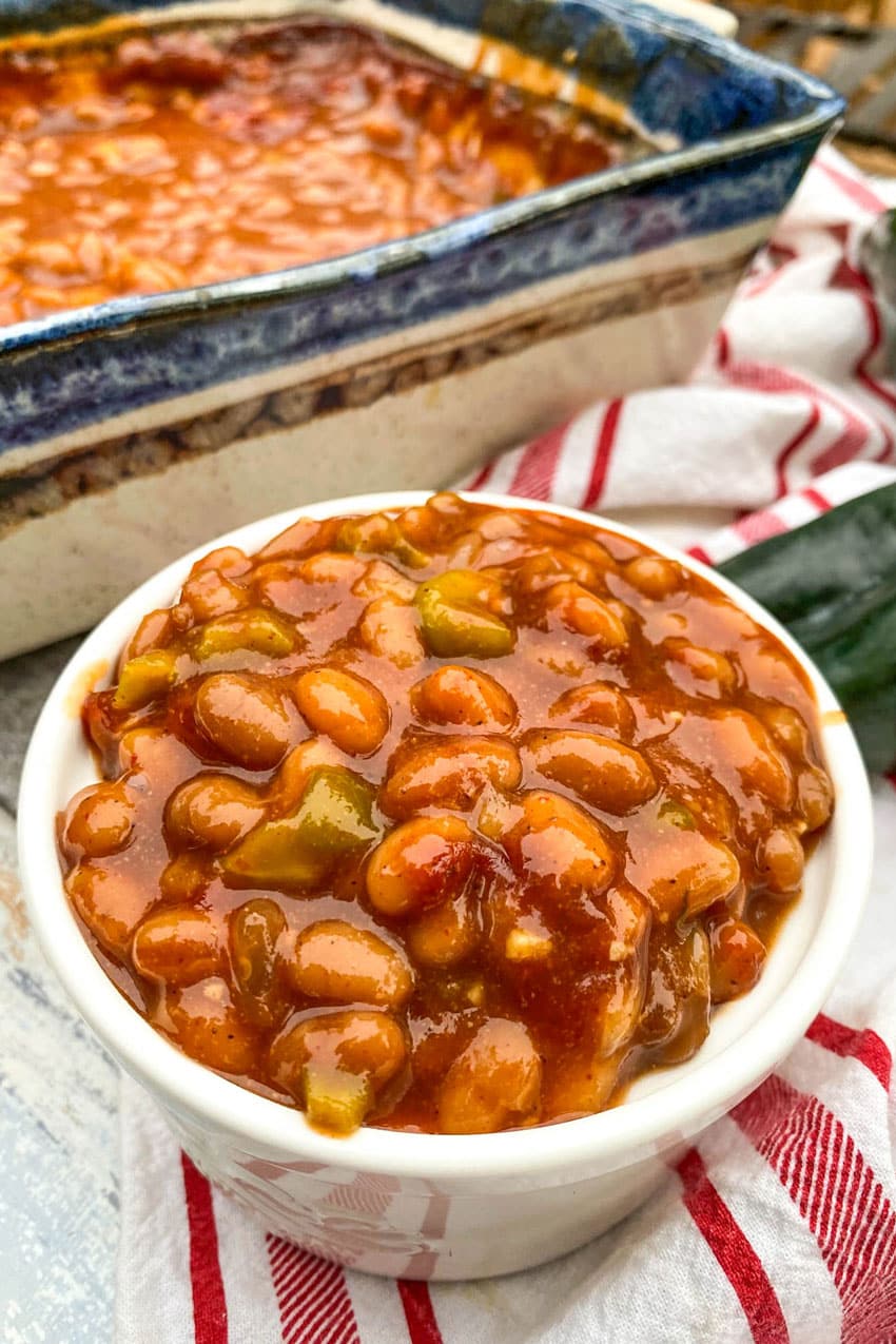 smoked baked beans in a small white ramekin 