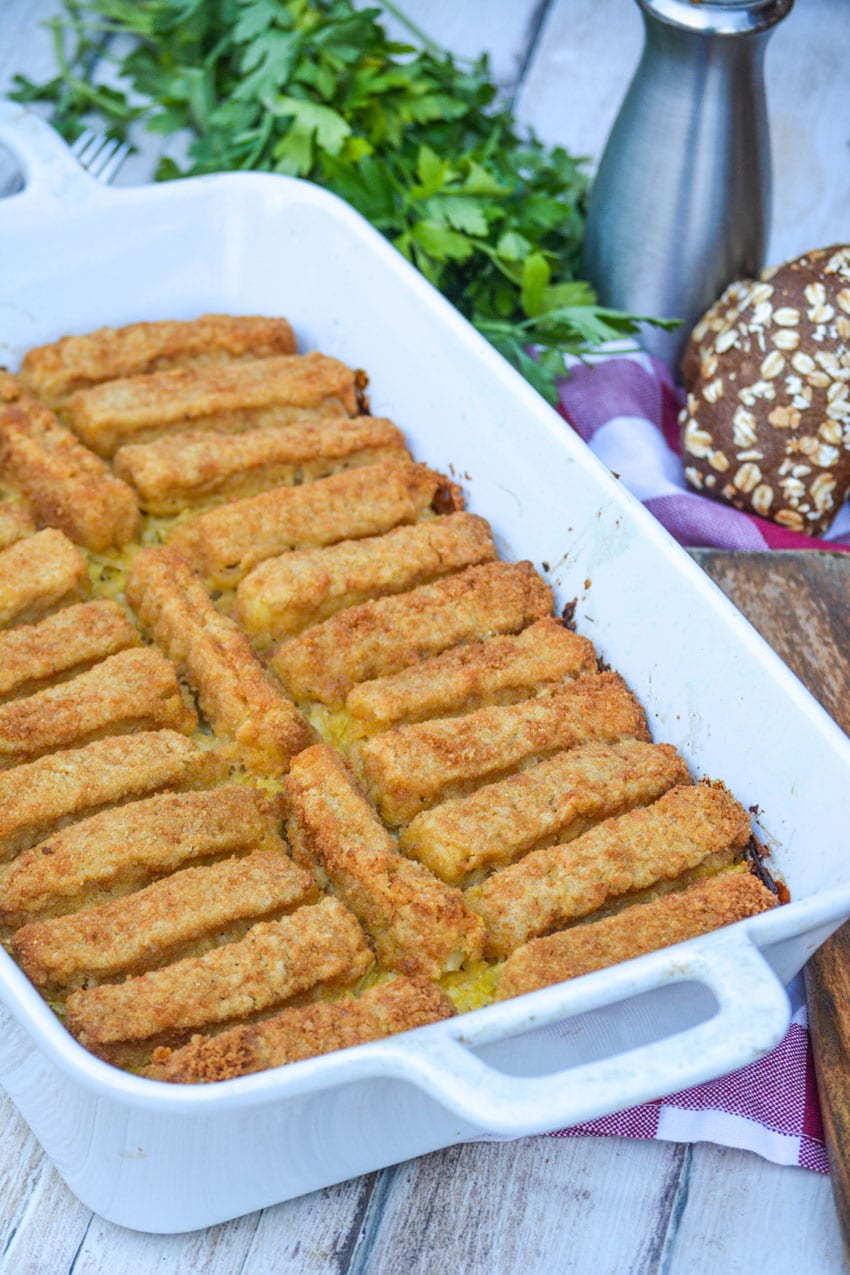 fish stick casserole in a large white baking dish