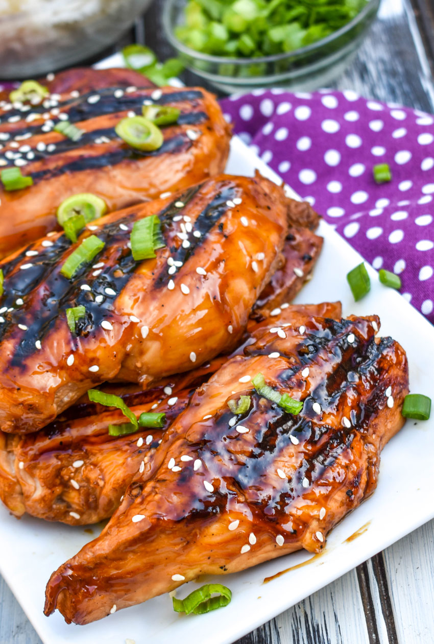 Grilled Huli Huli Chicken pieces of grilled huli huli chicken stacked on a white platter