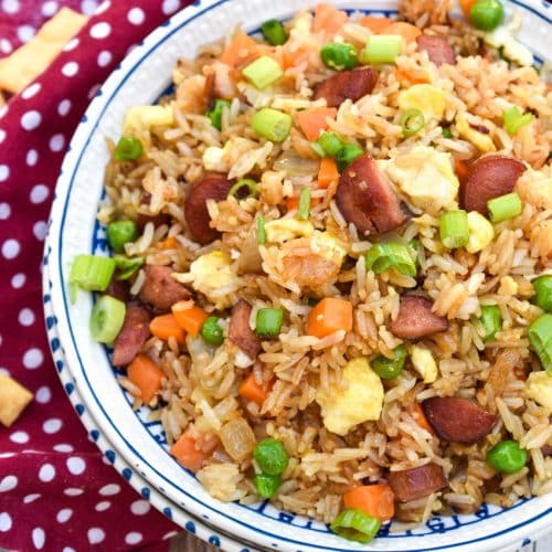 leftover hot dog fried rice in a white bowl