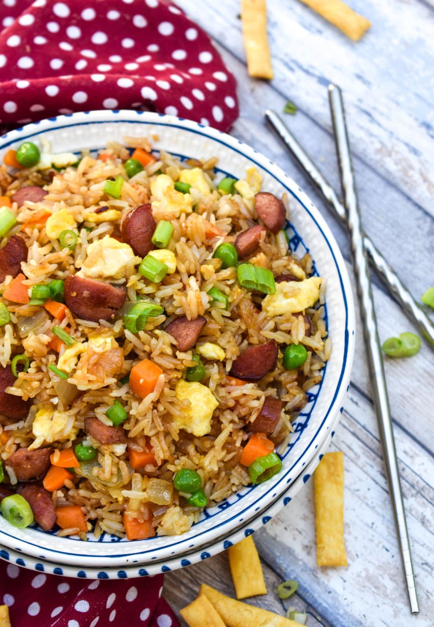 leftover hot dog fried rice in a white bowl