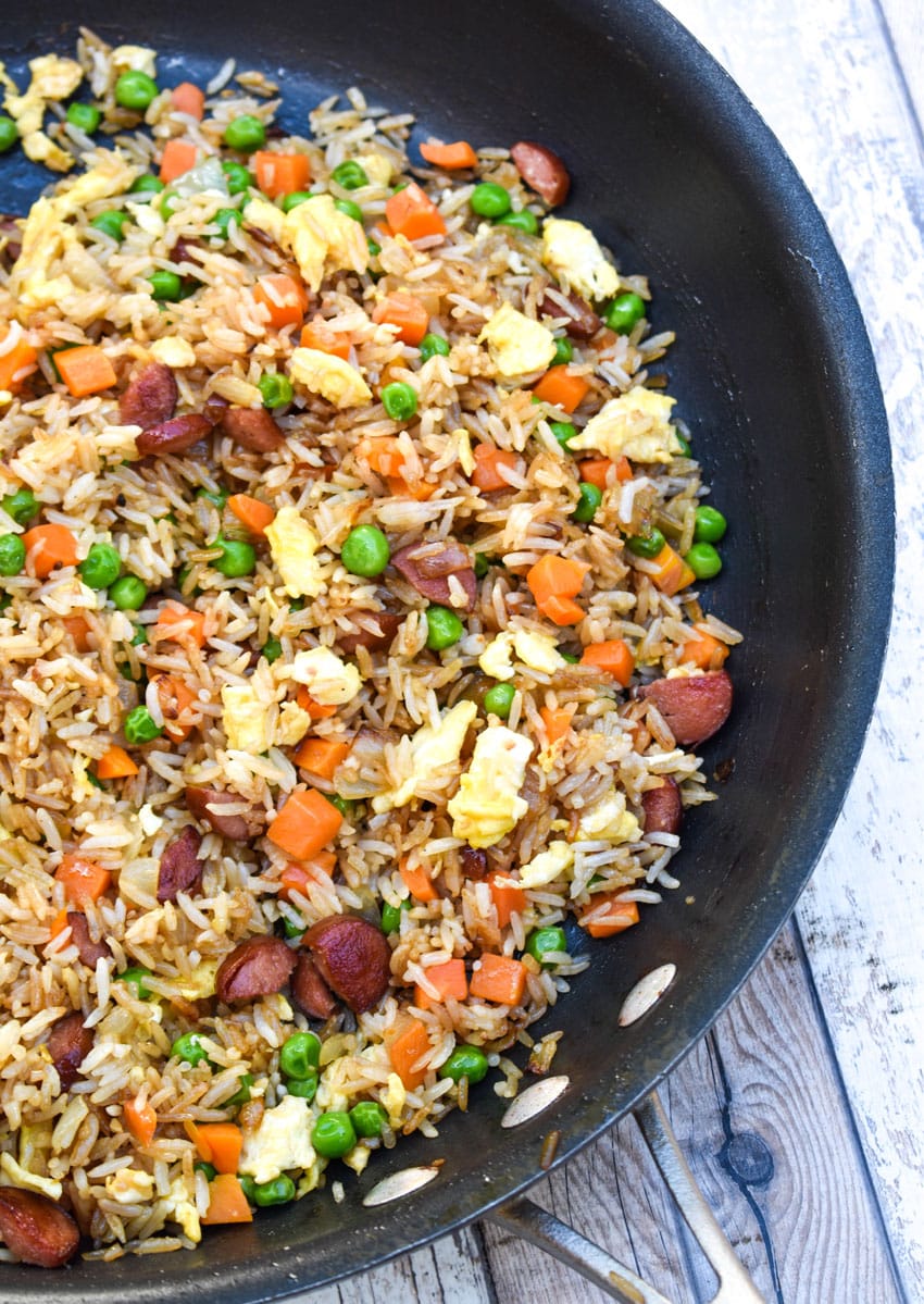 leftover hot dog fried rice in a black skillet