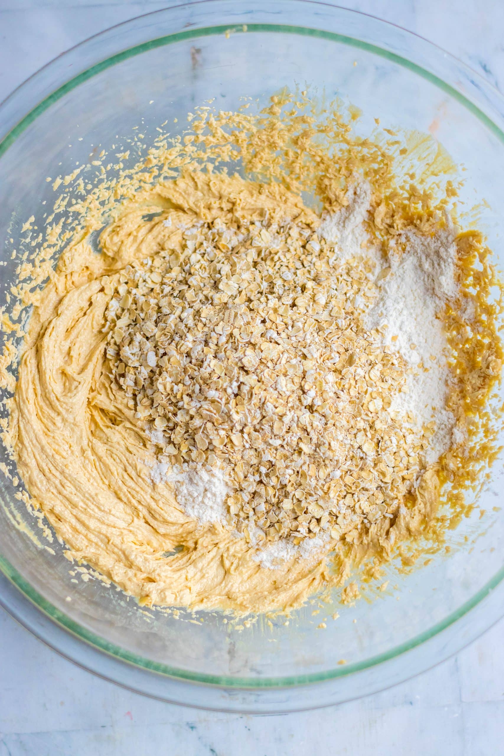 edible cookie dough ingredients in a large glass mixing bowl