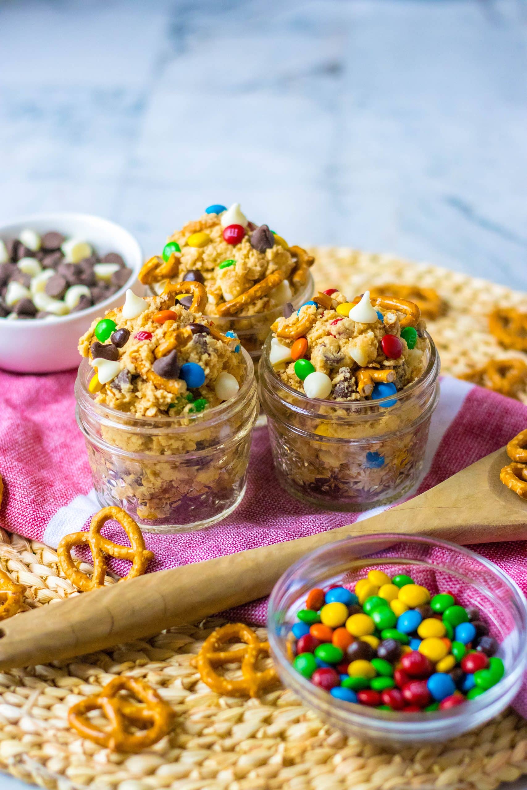 easy edible monster cookie dough in three small glass jars