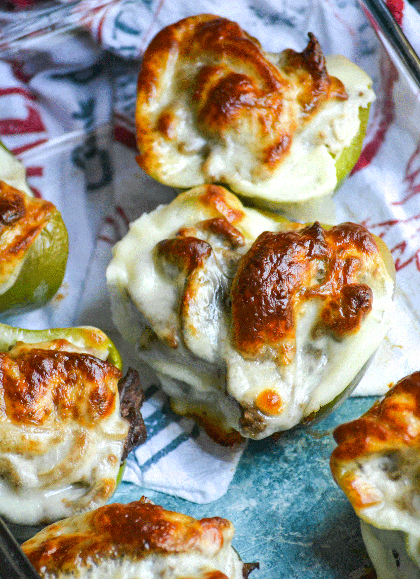 Philly Cheesesteak Stuffed Peppers philly cheesesteak stuffed peppers in a glass baking dish