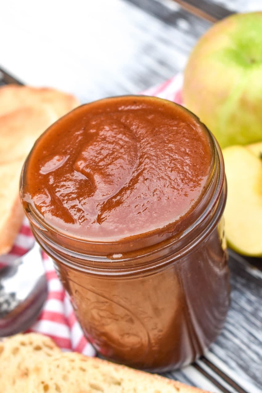 crockpot apple butter in a glass mason jar