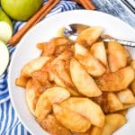 slow cooker cracker barrel fried apples in a shallow white bowl