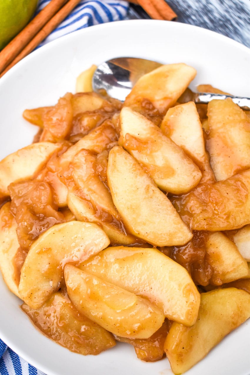slow cooker cracker barrel fried apples in a shallow white bowl