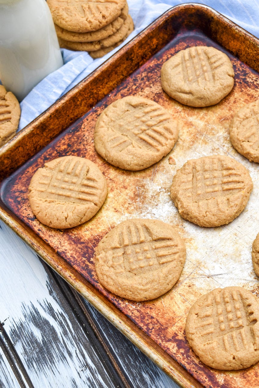 three ingredient peanut butter cookies on a metal sheet pan
