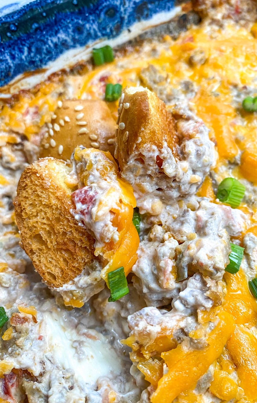 hamburger bun croutons dipped in cheeseburger dip