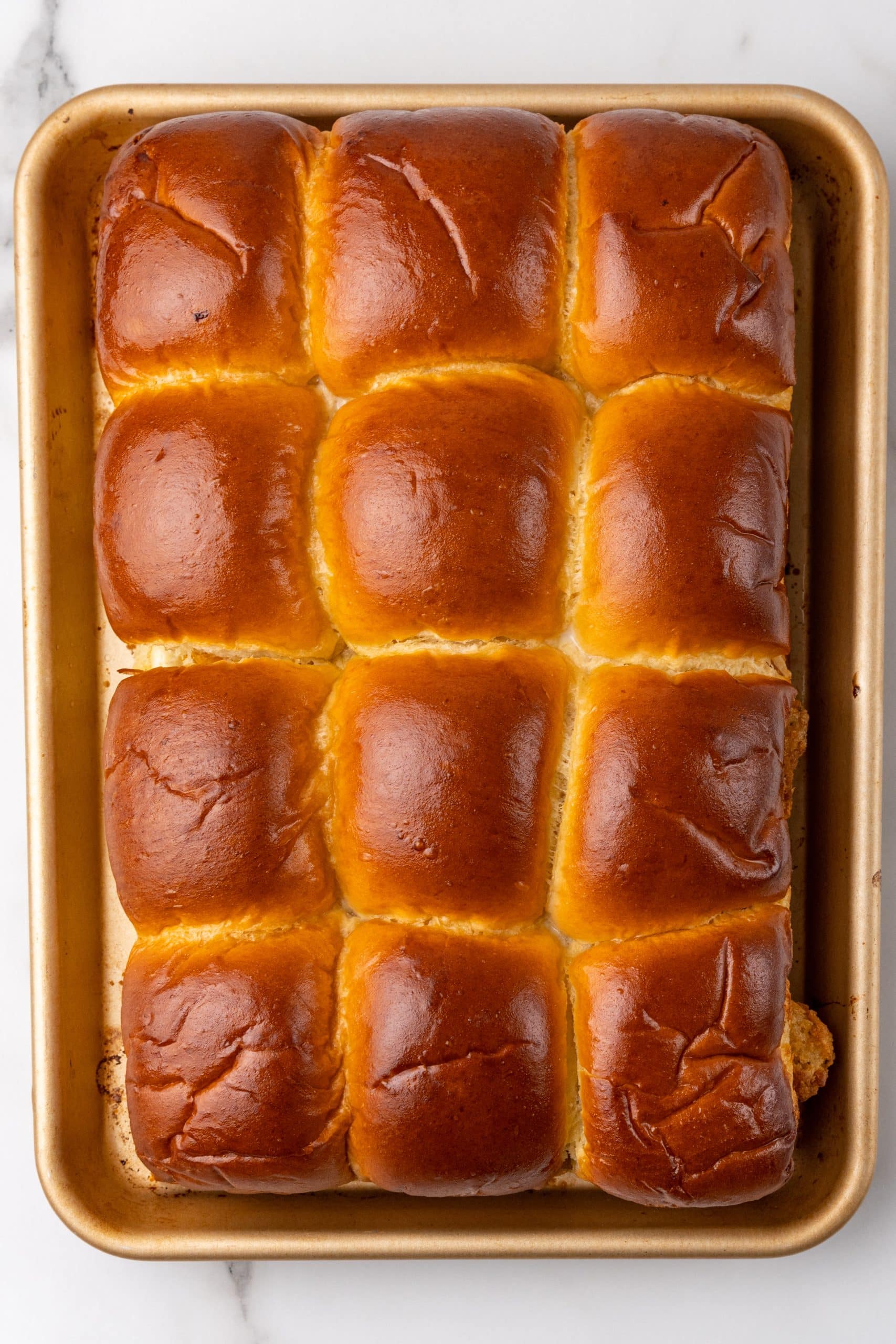 baked filet-o-fish sliders on a metal sheet pan