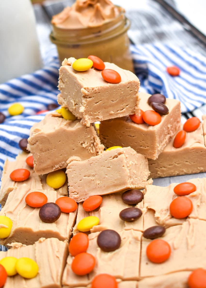 squares of Reese's peanut butter fudge stacked on top of each other