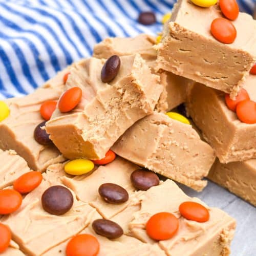 squares of Reese's peanut butter fudge stacked on top of each other