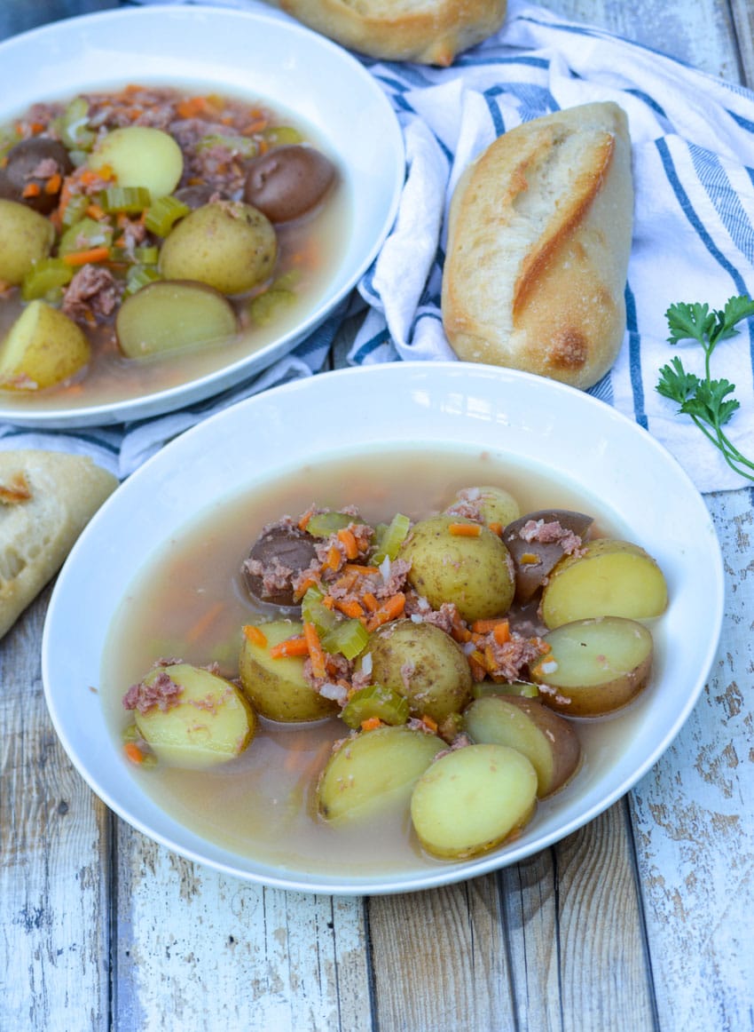 canned corned beef stew in a white bowl