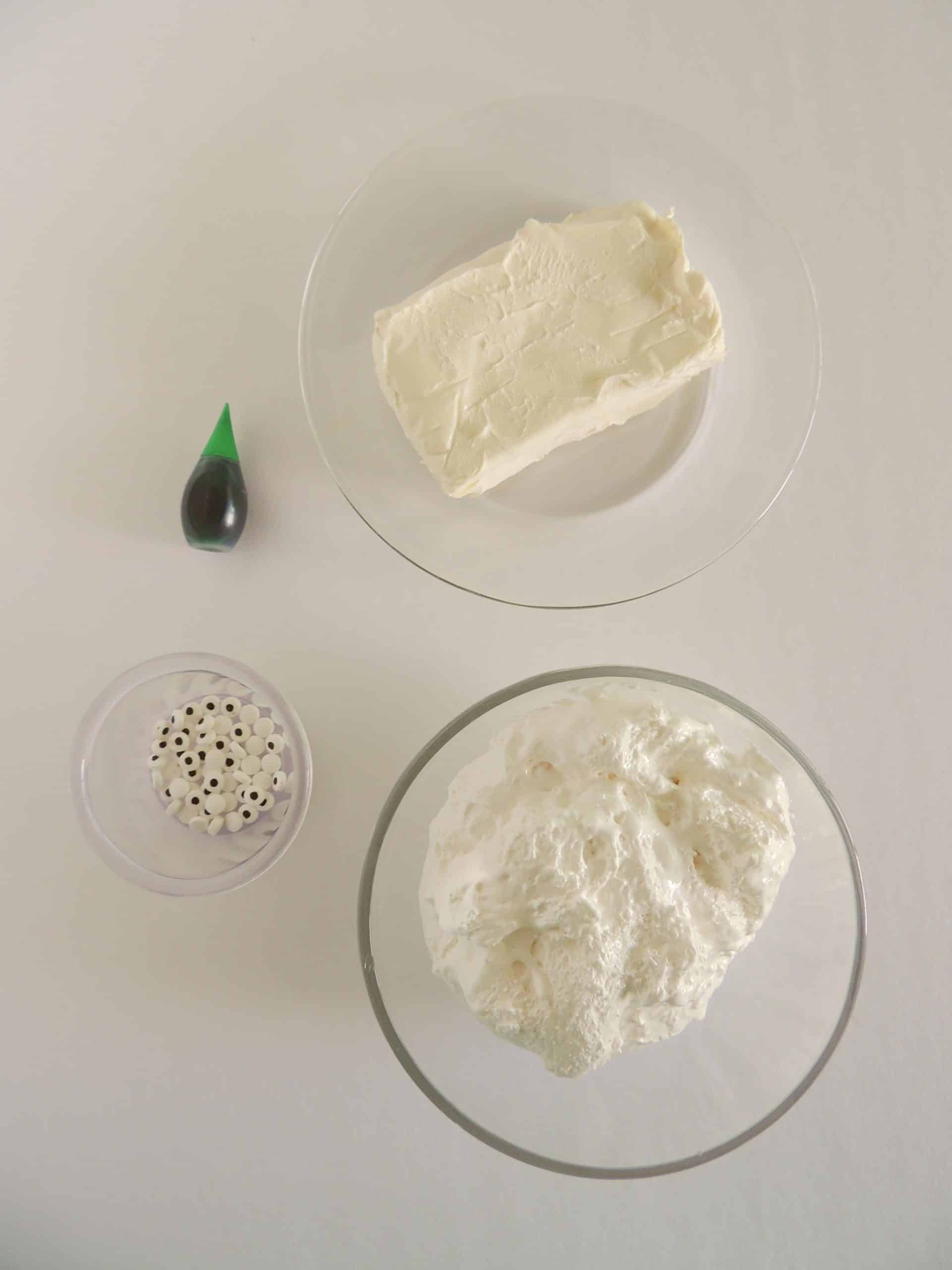 an overhead image showing the measured ingredients needed to make marshmallow cream cheese fruit dip