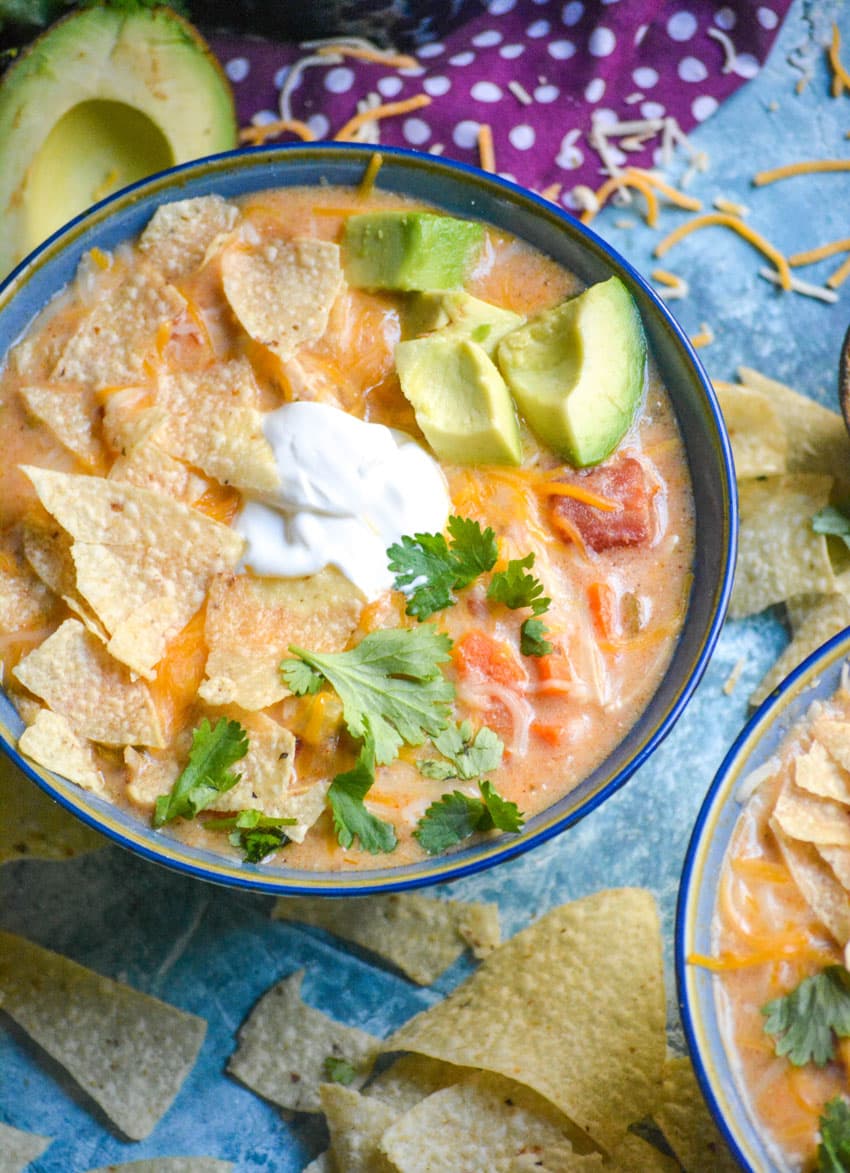 instant pot chicken tortilla soup in a blue bowl