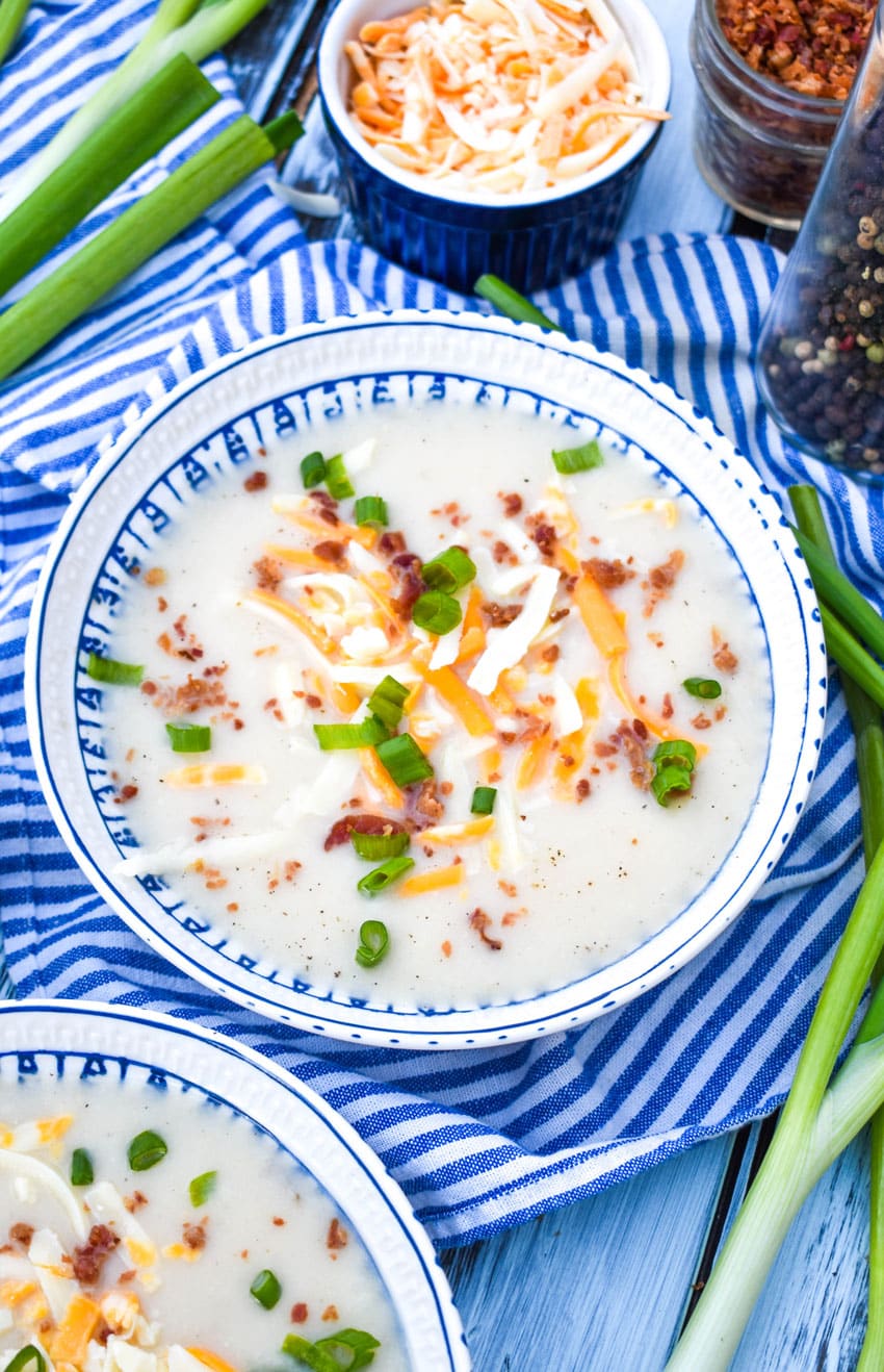 leftover mashed potato soup in aa blue and white bowl