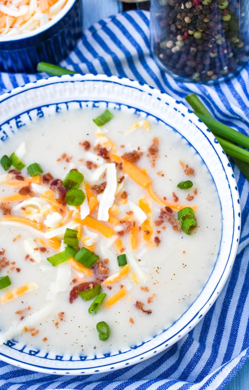 leftover mashed potato soup in aa blue and white bowl