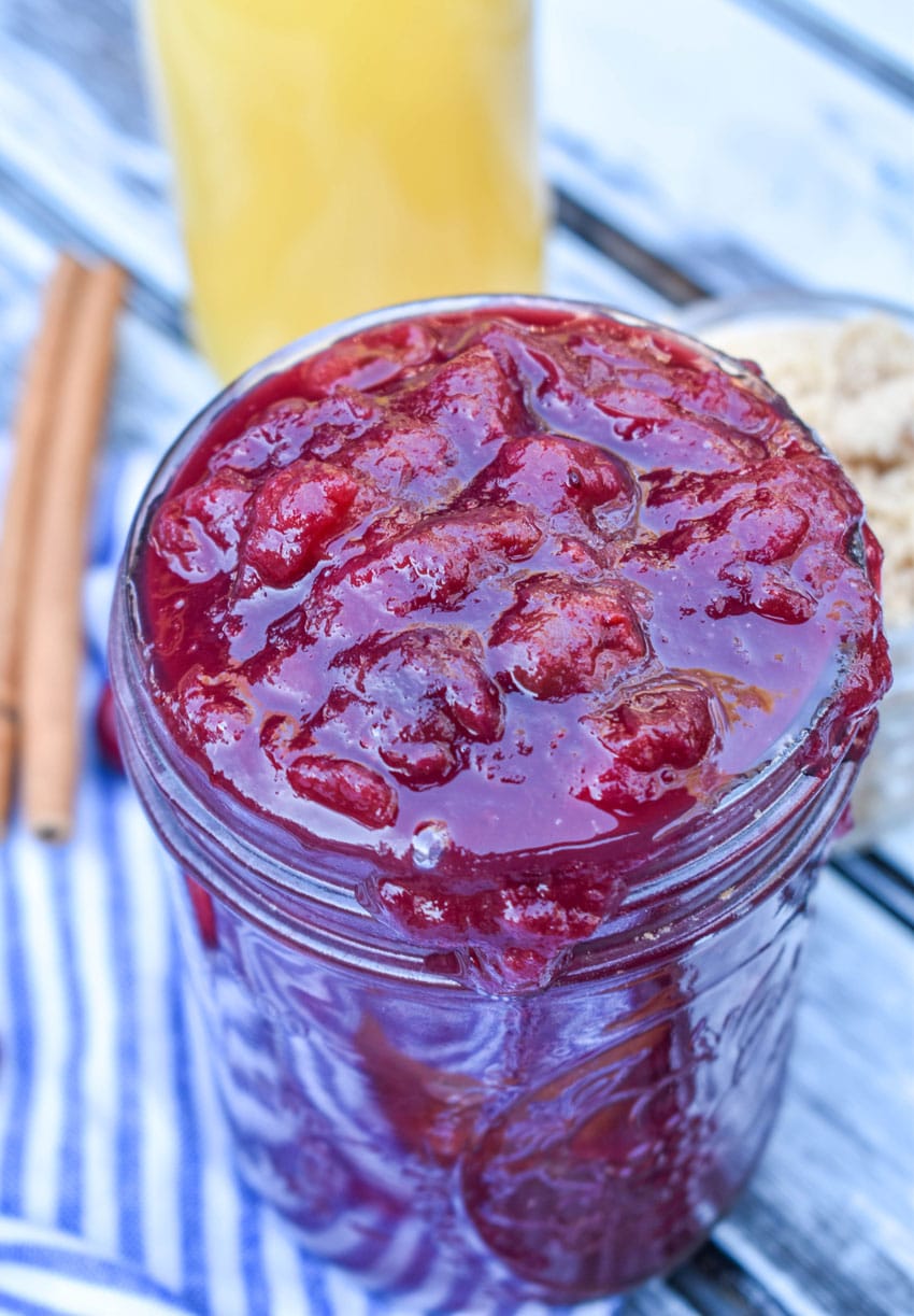 crockpot cranberry sauce in a glass mason jar