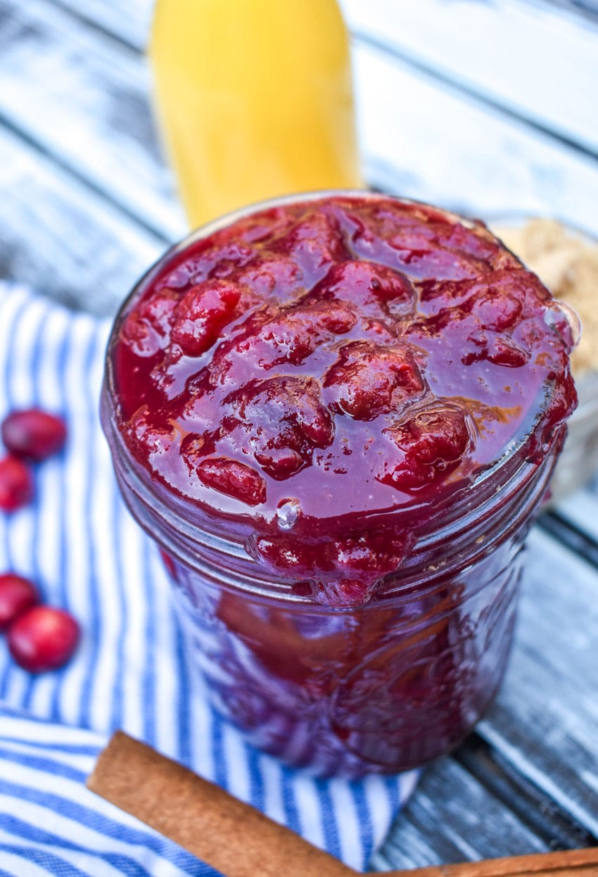 crockpot cranberry sauce in a glass mason jar
