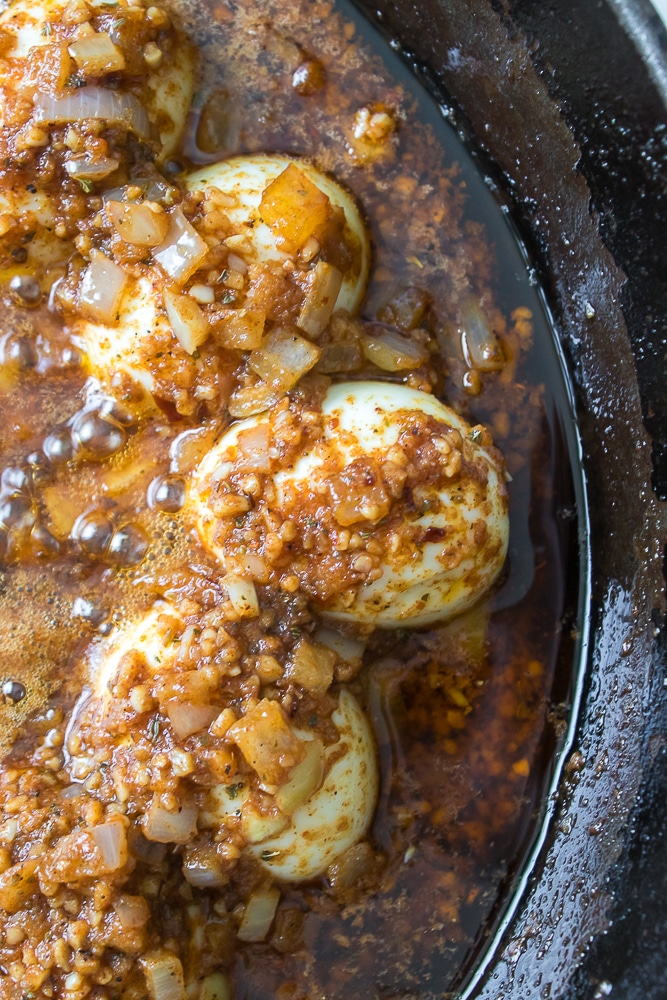 tiktok egg boil in a large cast iron skillet
