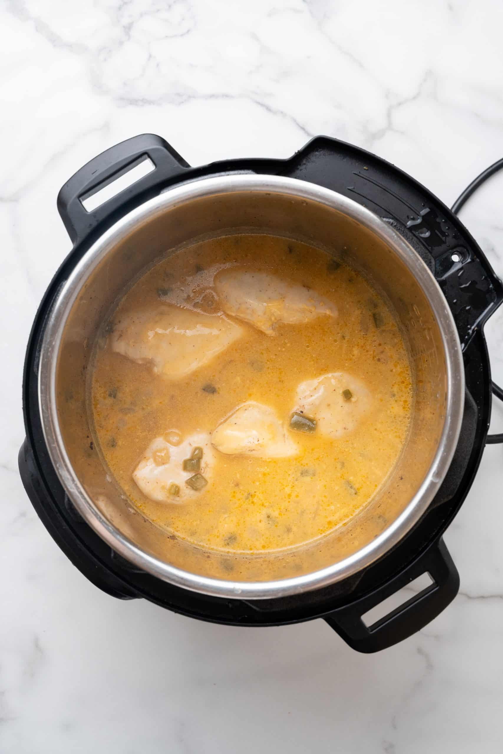 jalapeno cheddar chicken in the bowl of an instant pot