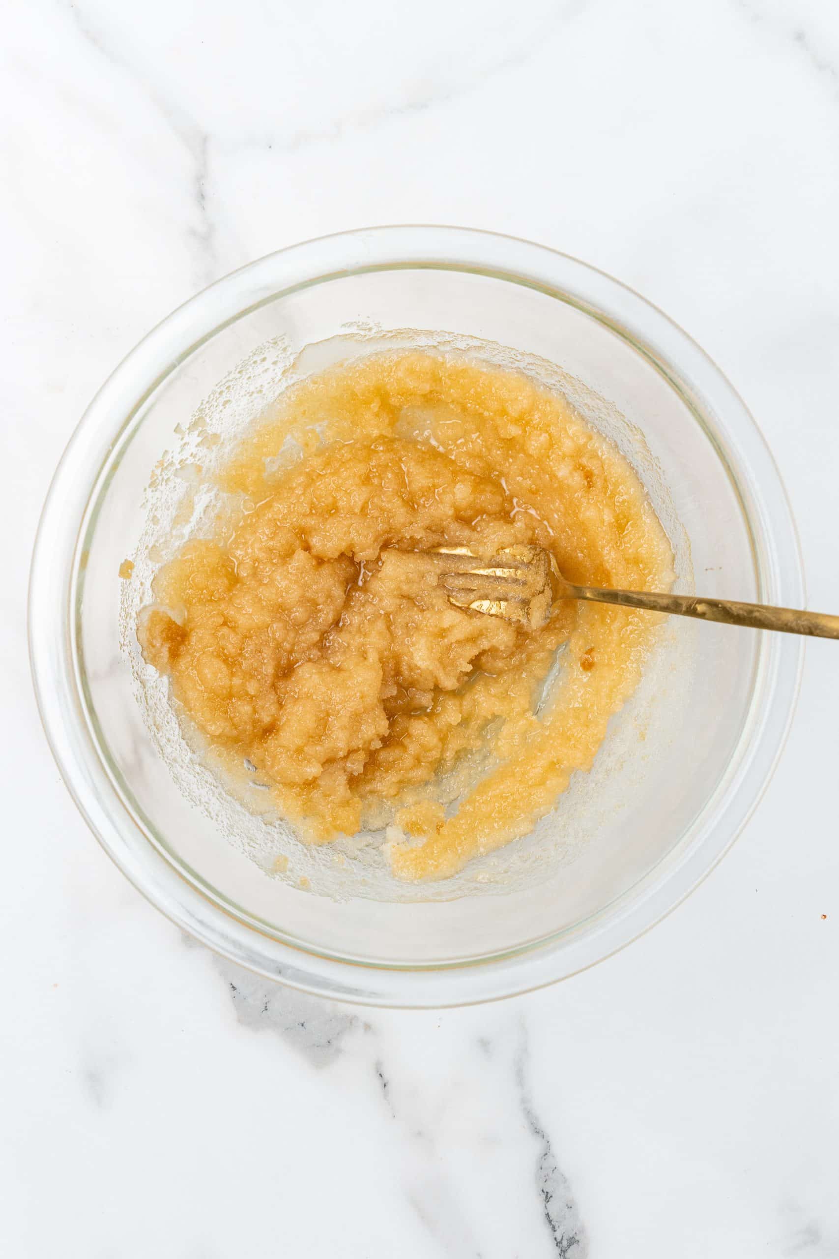creamed butter and sugar in a glass mixing bowl