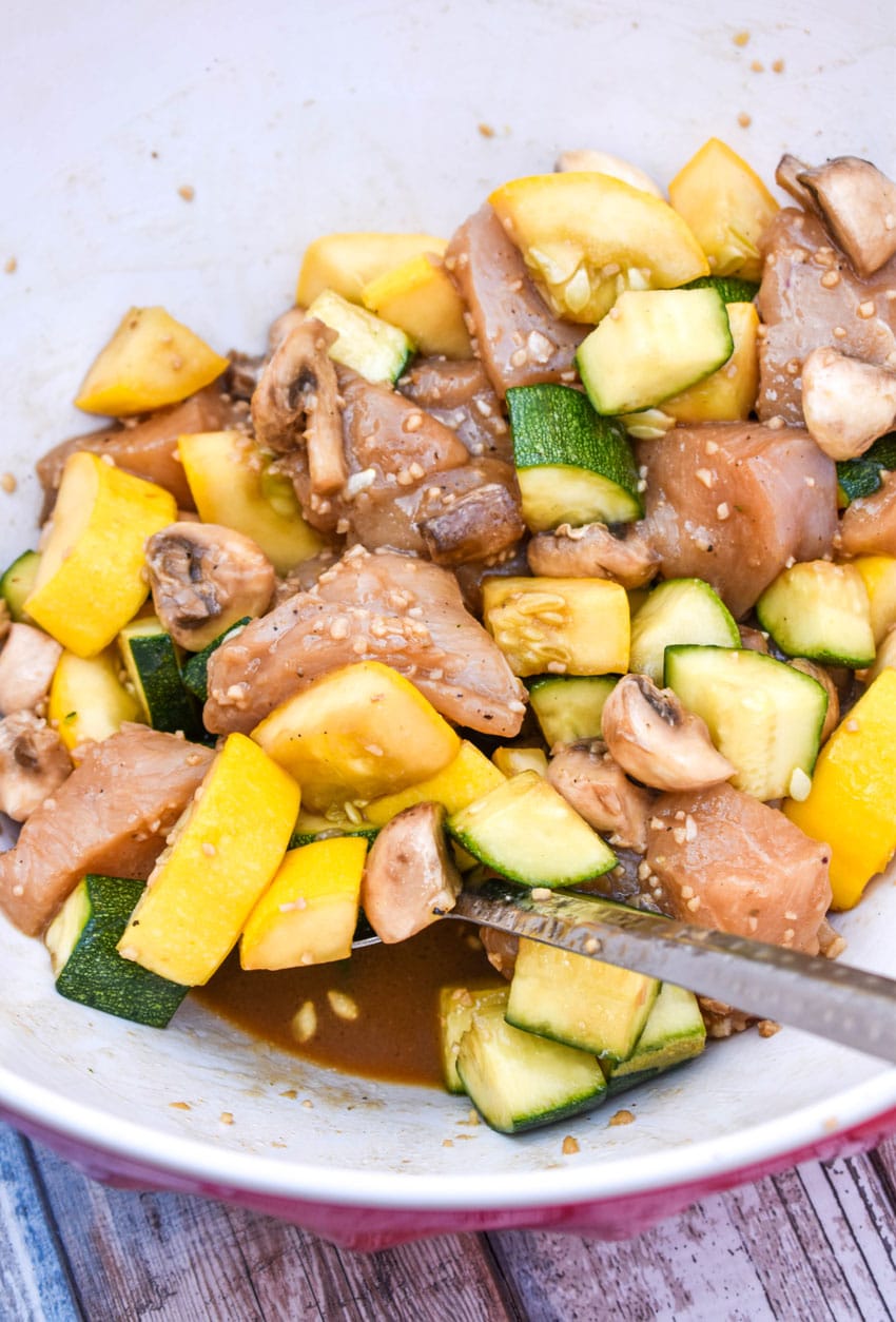 air fryer hibachi chicken and vegetables ingredients in a large mixing bowl