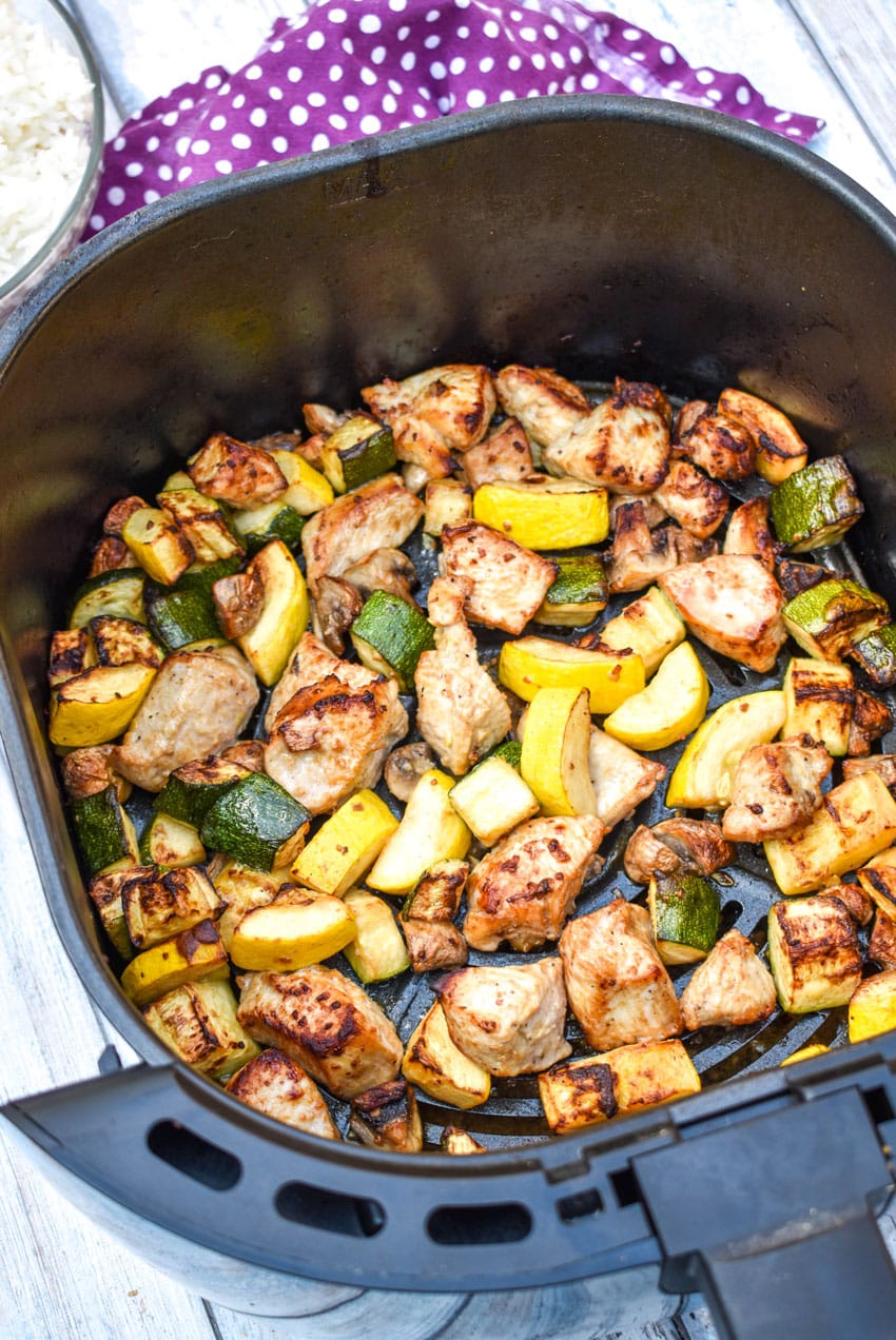 easy homemade hibachi chicken and vegetables in the basket of an air fryer