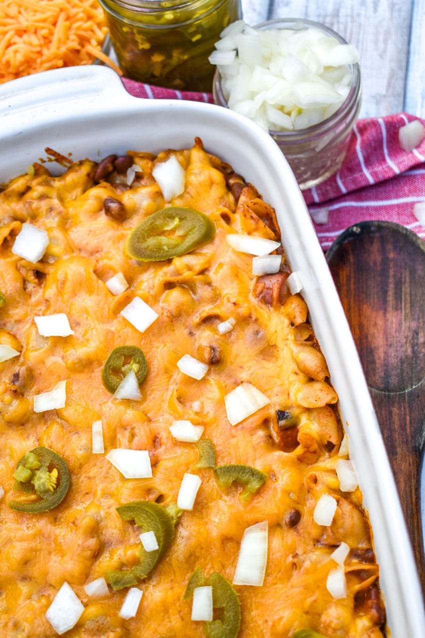 chili dog mac and cheese in a white baking dish
