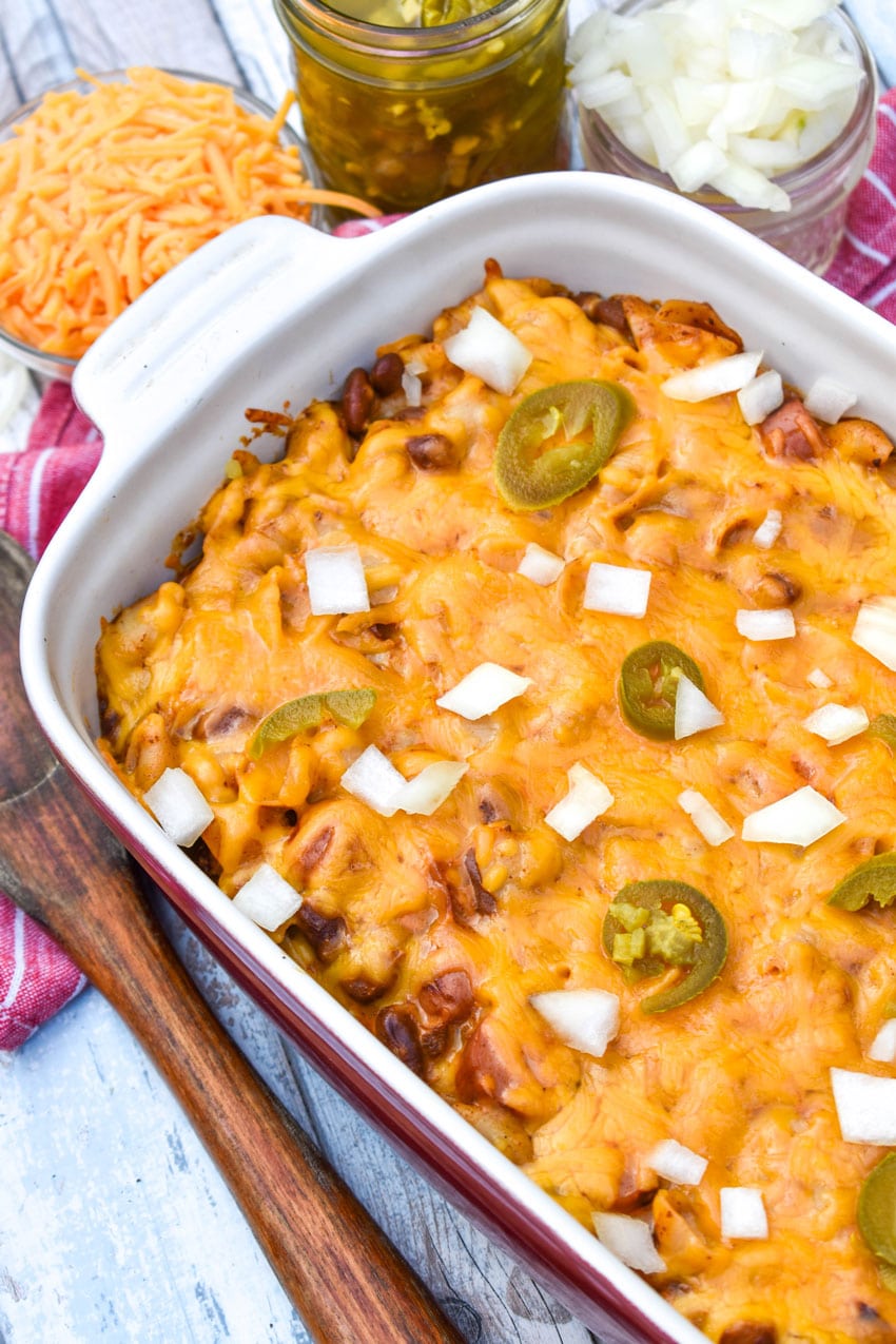chili dog mac and cheese in a white baking dish