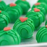 grinch truffles on a metal tray