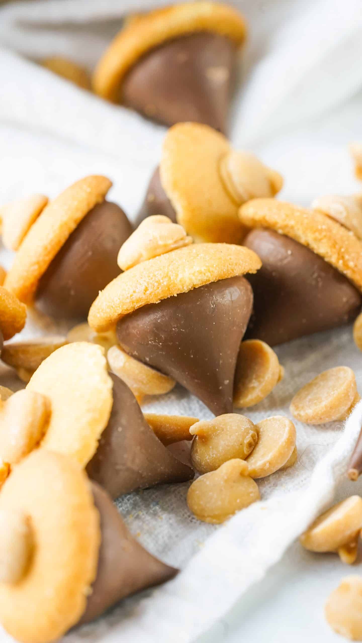 a group of acorn kisses on a white cloth napkin