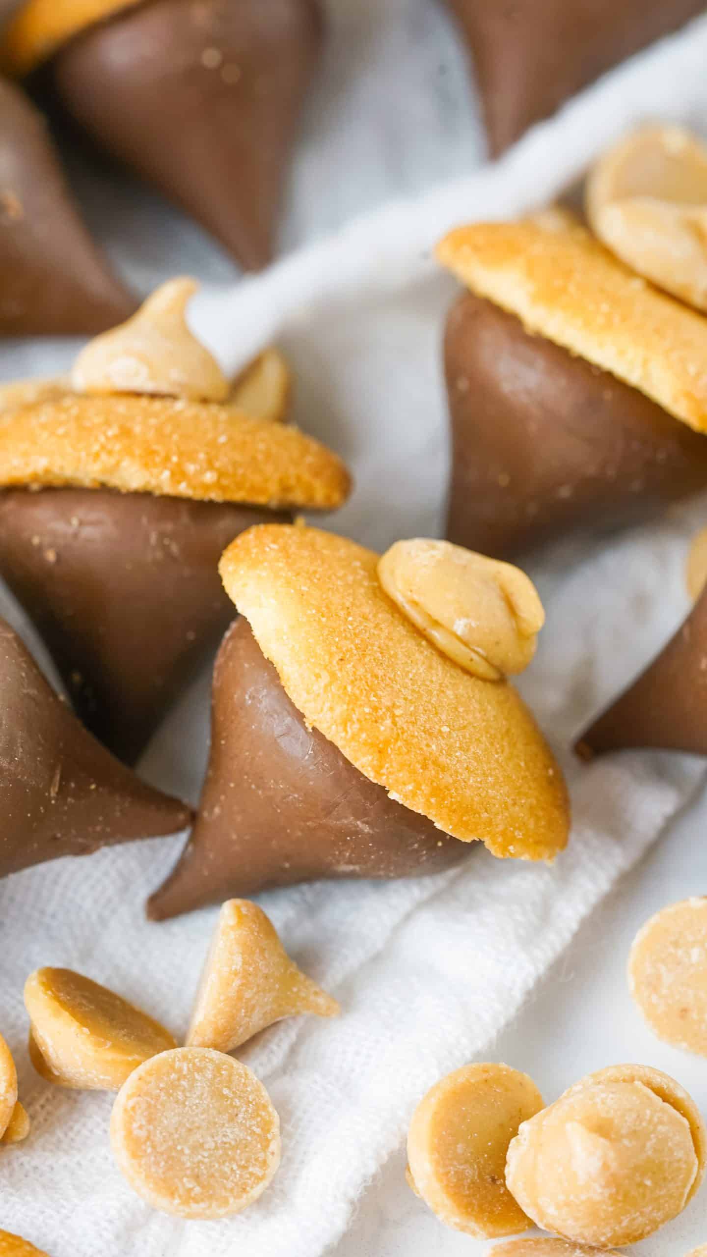 a group of acorn kisses on a white cloth napkin