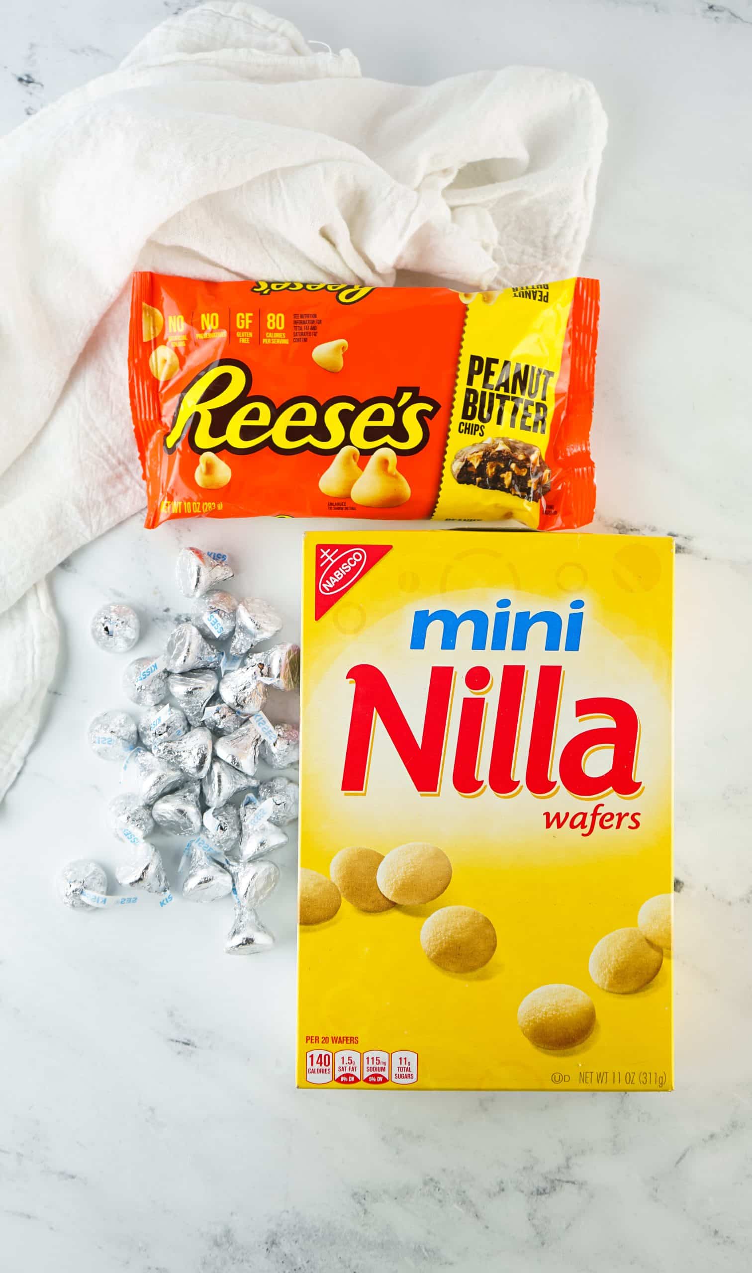 an overhead image showing the measured ingredients needed to make acorn kisses candies