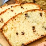 slices of chocolate chip pound cake on a wooden cutting board