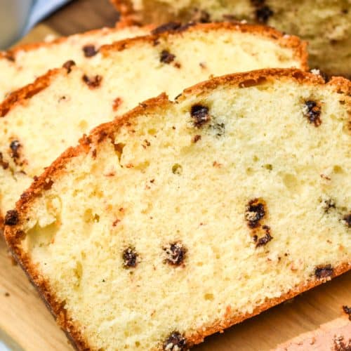 slices of chocolate chip pound cake on a wooden cutting board