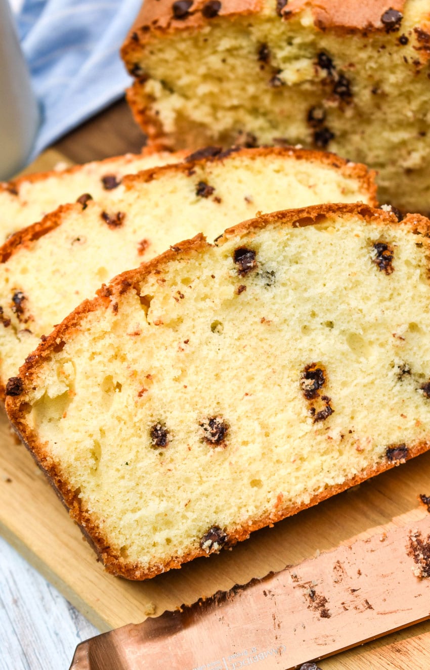 slices of chocolate chip pound cake on a wooden cutting board