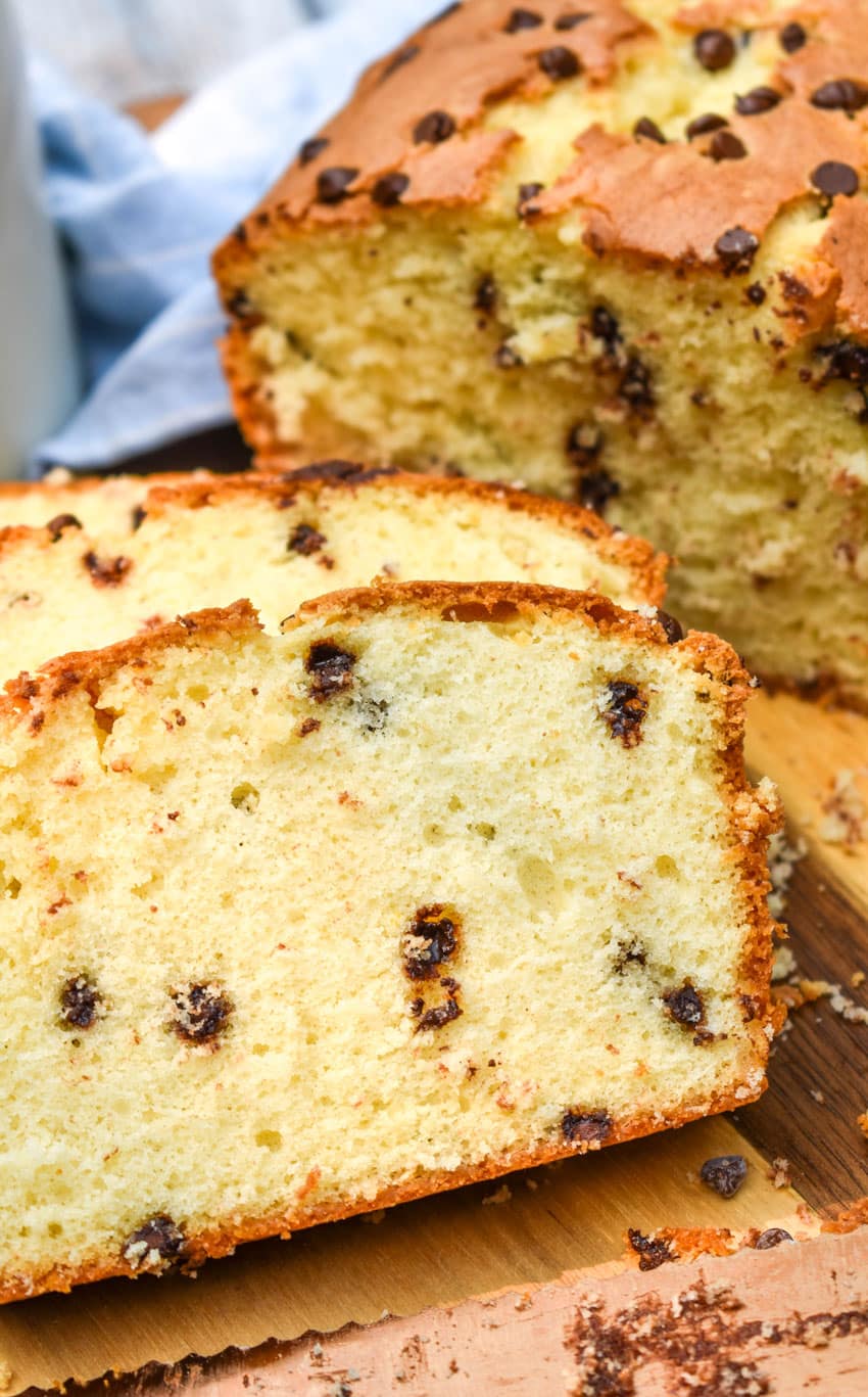 slices of chocolate chip pound cake on a wooden cutting board