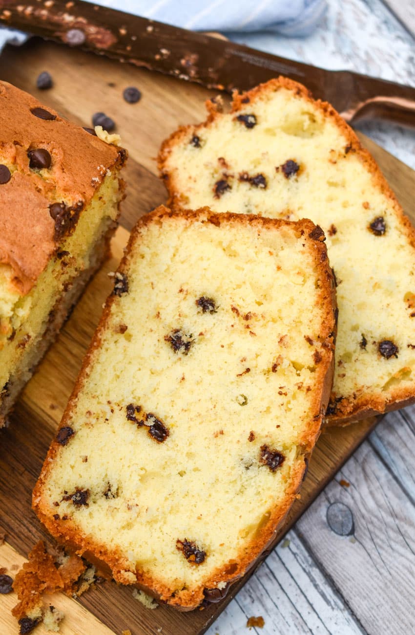 slices of chocolate chip pound cake on a wooden cutting board