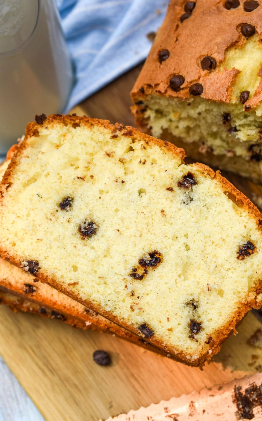 slices of chocolate chip pound cake on a wooden cutting board